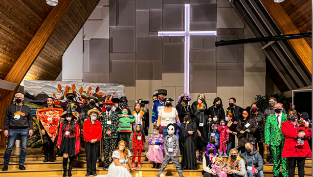 Youth and families at Highlands wearing Halloween costumes