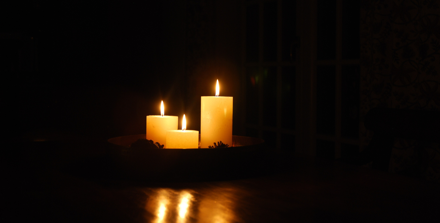 candles on a dark backrground